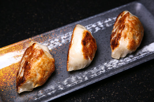 D13. Pan Fried Dumplings  |  香煎锅贴